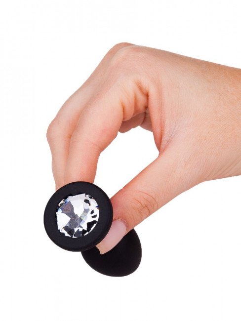 Чёрная анальная втулка с прозрачным кристаллом - 7,3 см. Чёрная анальная втулка с прозрачным кристаллом - 7,3 см.