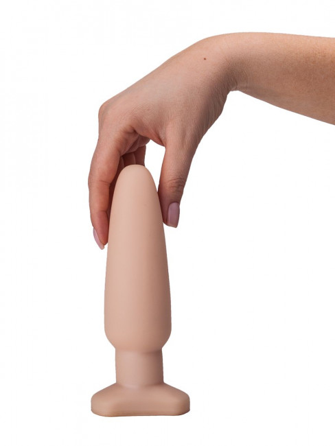 Телесный анальный плаг среднего размера - 18 см. Телесный анальный плаг среднего размера - 18 см.
