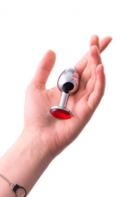 Малая серебристая анальная втулка с красным кристаллом - 6 см. Малая серебристая анальная втулка с красным кристаллом - 6 см.