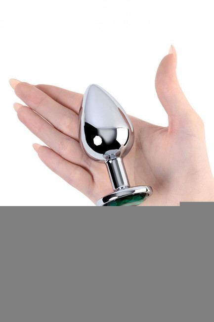 Серебристая коническая анальная втулка с зеленым кристаллом - 9,5 см. Серебристая коническая анальная втулка с зеленым кристаллом - 9,5 см.