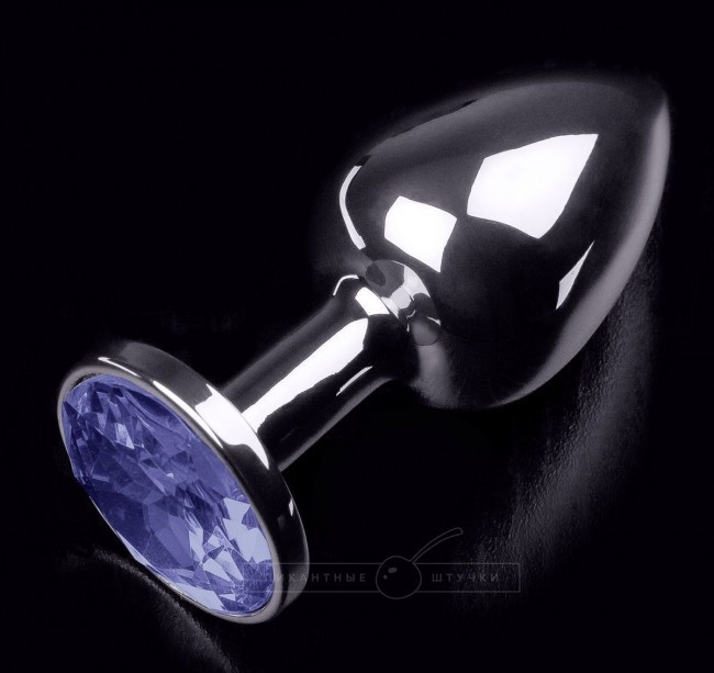 	Маленькая серебристая анальная пробка с круглым кончиком и фиолетовым кристаллом - 7 см.