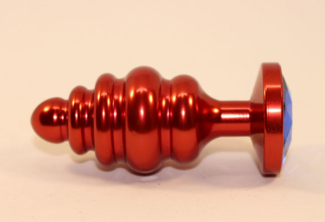 Красная фигурная пробка с синим стразом - 7,3 см. Красная фигурная пробка с синим стразом - 7,3 см.