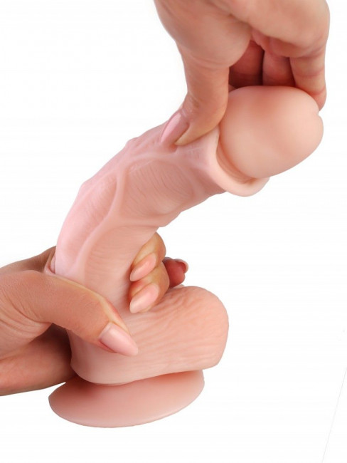 Телесный реалистичный фаллоимитатор с хребтом из киберкожи - 20 см. Телесный реалистичный фаллоимитатор с хребтом из киберкожи - 20 см.