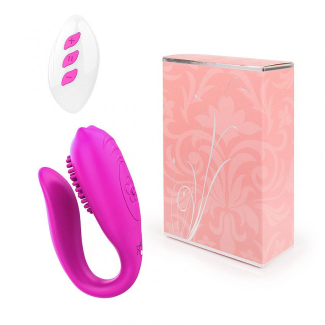 Ярко-розовый изогнутый вибромассажер с шипиками Ярко-розовый изогнутый вибромассажер с шипиками