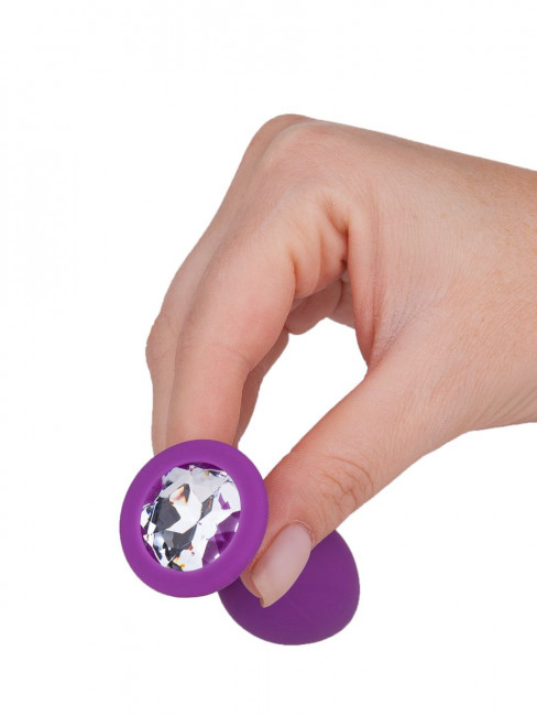 Фиолетовая силиконовая пробка с прозрачным кристаллом - 7,3 см. Фиолетовая силиконовая пробка с прозрачным кристаллом - 7,3 см.